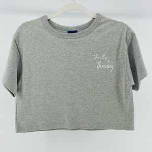 “Thrify + Thriving" Printed Champion Short Sleeve Cropped Tee in Grey